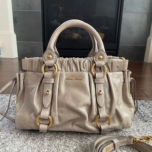 Authentic Miu Miu gathered